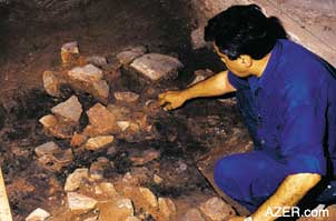 Dr. Vilayat Karimov of Baku's Institute of Archaeology and Ethnography served as the Director of Excavations. Here he points to pottery shards that were identified as Kur-Araz pottery of the 3rd century B.C.
