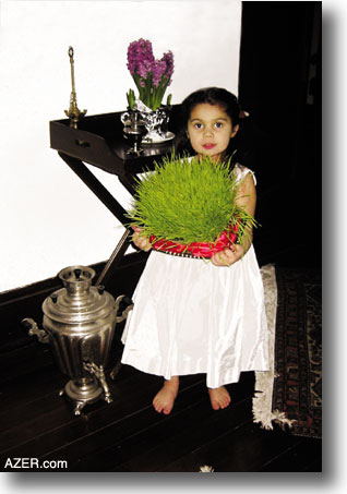 Inara Abernathy celebrates Novruz. Sprouted wheat of grain is a Novruz symbol. Abernathy family 